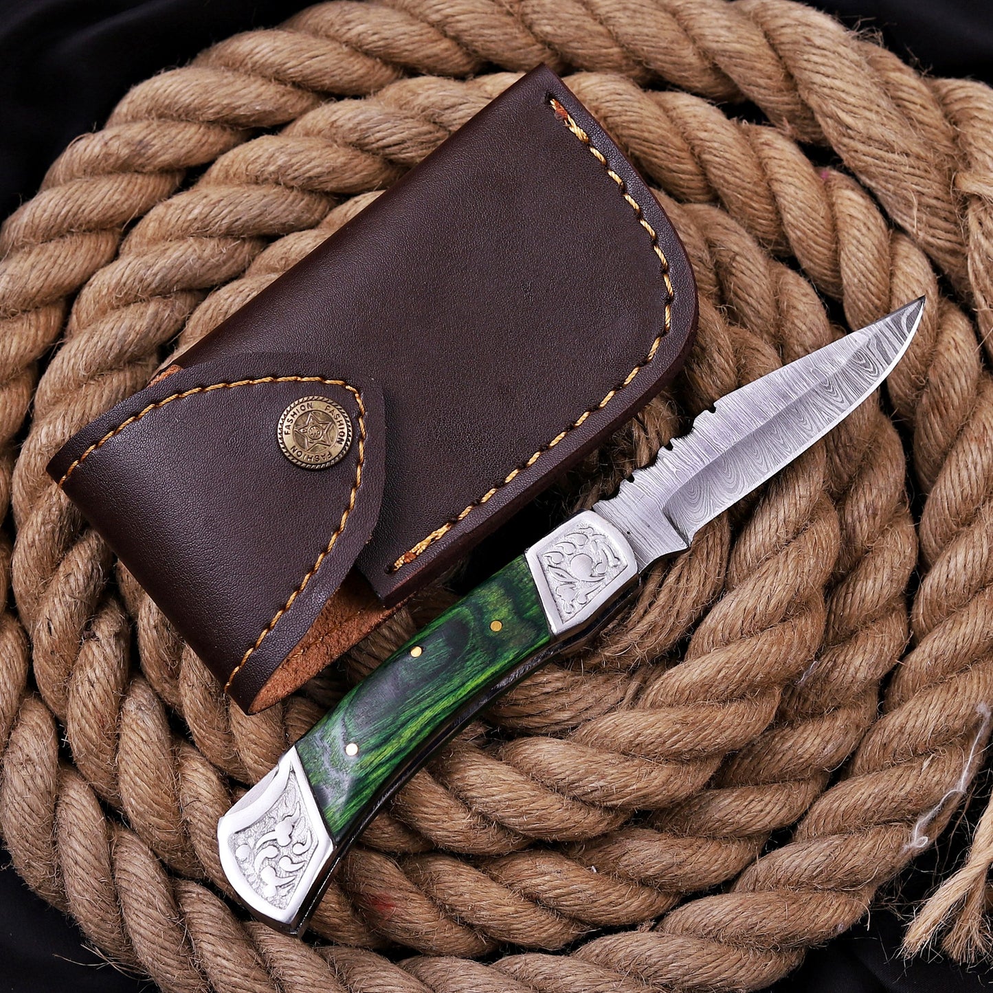 Handmade Damascus Steel Folding Knife | Black Wood Handle & Engraved Bolsters